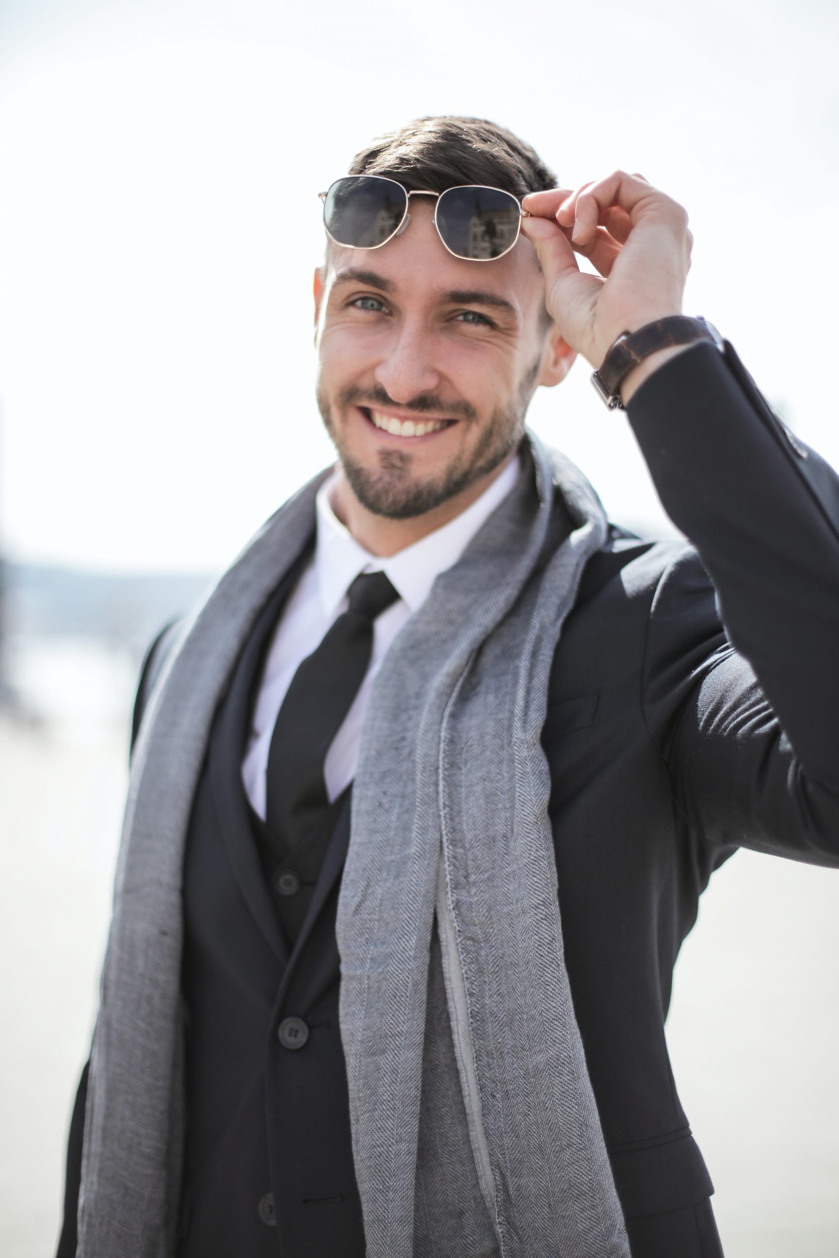 happy man in a suit and sunglasses